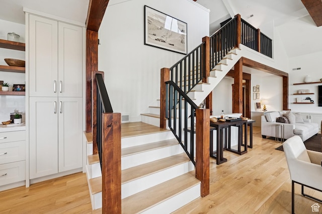 9388 Dye Cabins Dr, Park City, UT 84098 - stairway with wood finished floors, high vaulted ceiling, and beamed ceiling