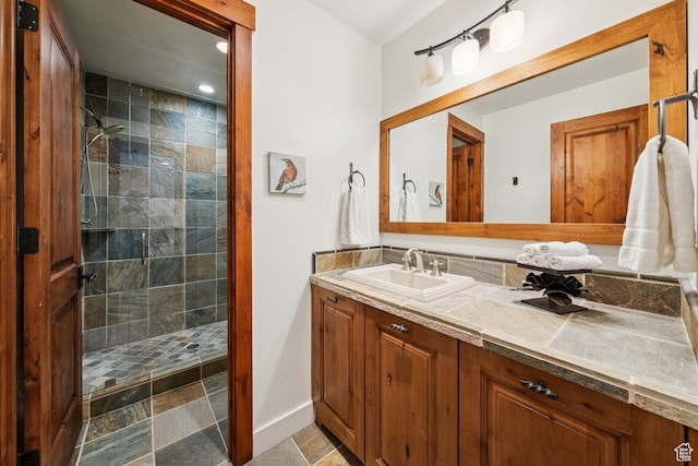 9388 Dye Cabins Dr, Park City, UT 84098 - bathroom featuring vanity, a tile shower, and recessed lighting
