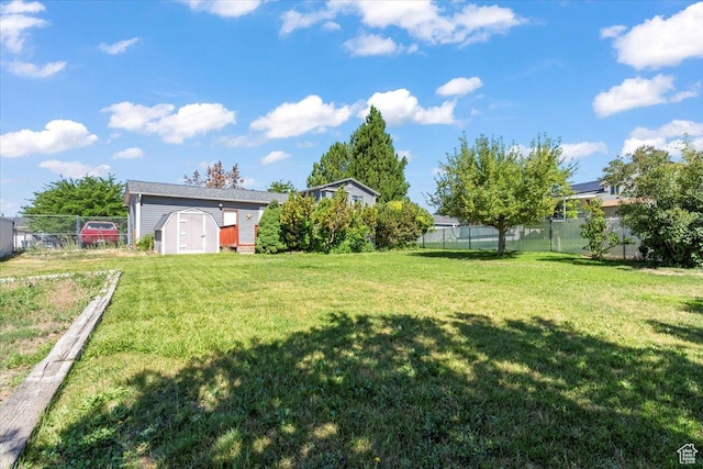 4970 S 4150 W, Roy, UT 84067 - view of yard featuring a storage unit