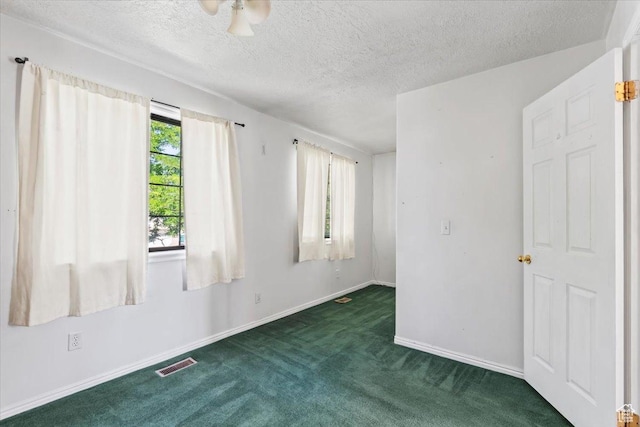 4970 S 4150 W, Roy, UT 84067 - carpeted empty room featuring a textured ceiling and baseboards