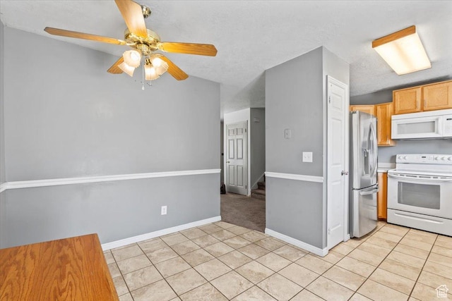 4970 S 4150 W, Roy, UT 84067 - kitchen with white appliances, light tile patterned floors, ceiling fan, and light countertops
