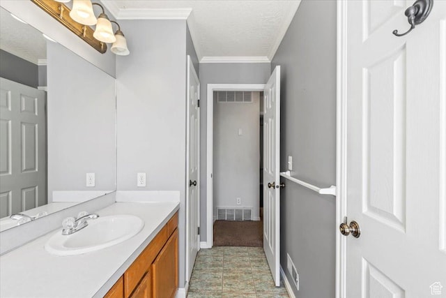 4970 S 4150 W, Roy, UT 84067 - bathroom featuring vanity, crown molding, and a textured ceiling