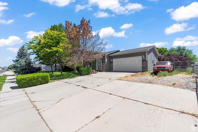 4970 S 4150 W, Roy, UT 84067 - view of front of home featuring an attached garage and concrete driveway