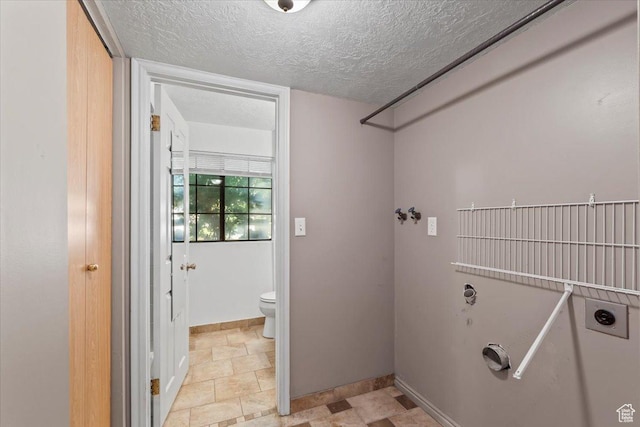 4970 S 4150 W, Roy, UT 84067 - laundry room with electric dryer hookup and a textured ceiling