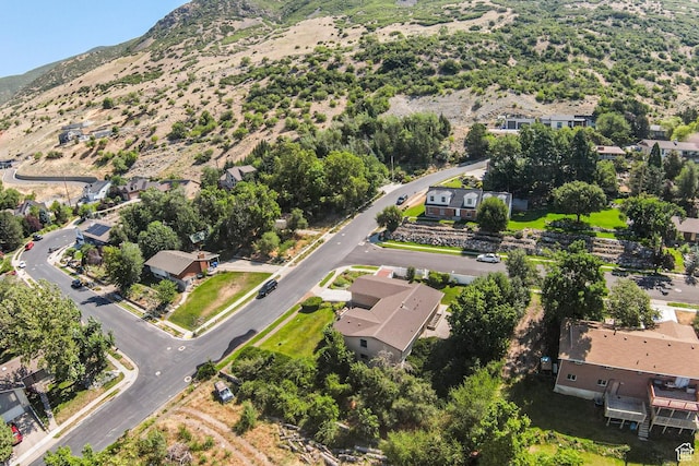 342 E State St, Farmington, UT 84025 - aerial overview of property's location with a mountainous background and nearby suburban area