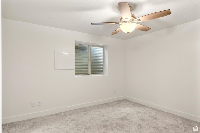 1538 N Mackinaw Way, Garden City, UT 84028 - carpeted spare room featuring baseboards and ceiling fan