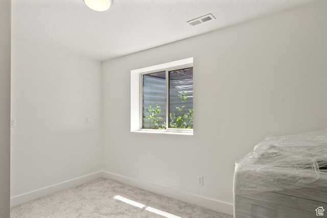 1538 N Mackinaw Way, Garden City, UT 84028 - unfurnished bedroom featuring carpet flooring and baseboards