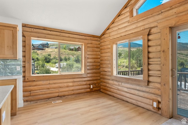 1538 N Mackinaw Way, Garden City, UT 84028 - unfurnished sunroom featuring vaulted ceiling
