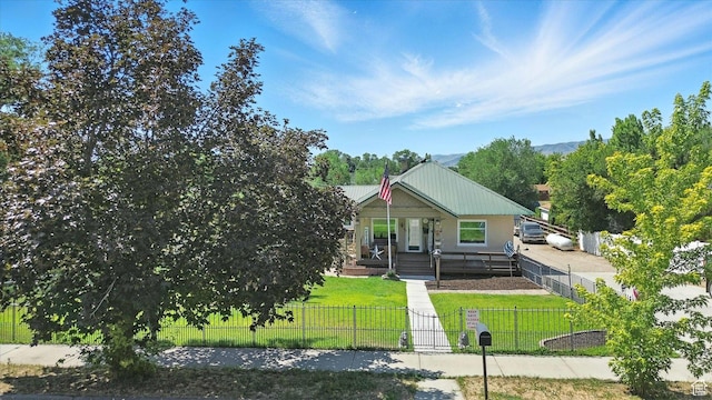 367 W 400 N, Malad City, ID 83252 - view of front of property featuring a porch and a fenced front yard