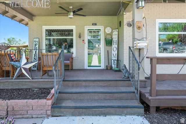 367 W 400 N, Malad City, ID 83252 - view of exterior entry with brick siding, a porch, and a ceiling fan