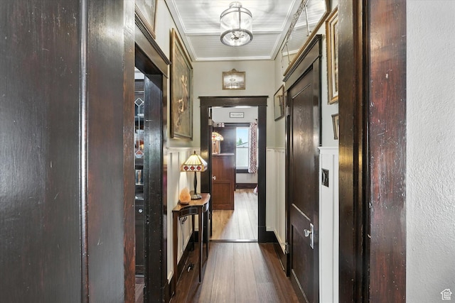 367 W 400 N, Malad City, ID 83252 - hallway with dark wood-type flooring, a wainscoted wall, ornamental molding, and a chandelier