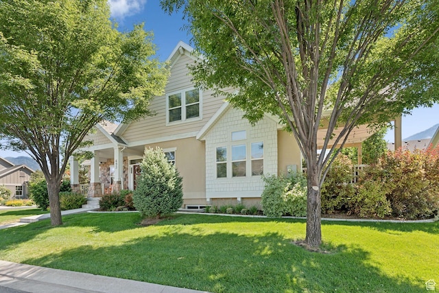 693 S Silver Leaf Dr W, Mapleton, UT 84664 - view of front facade featuring a front lawn and covered porch