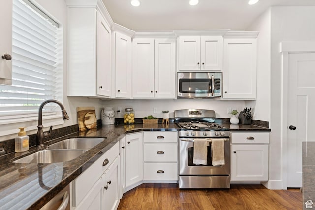 693 S Silver Leaf Dr W, Mapleton, UT 84664 - kitchen featuring appliances with stainless steel finishes, white cabinets, plenty of natural light, and recessed lighting