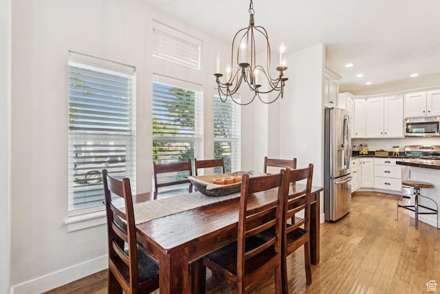 693 S Silver Leaf Dr W, Mapleton, UT 84664 - dining room with light wood-style floors, a chandelier, and recessed lighting