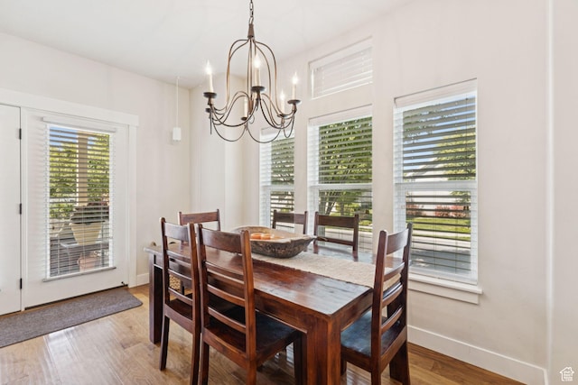 693 S Silver Leaf Dr W, Mapleton, UT 84664 - dining space featuring a chandelier and light wood-style floors