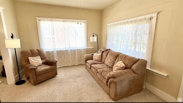 60 W 100th St N, Fillmore, UT 84631 - living area with carpet floors and plenty of natural light