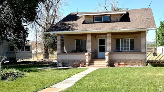 60 W 100th St N, Fillmore, UT 84631 - bungalow-style home featuring a shingled roof and brick siding