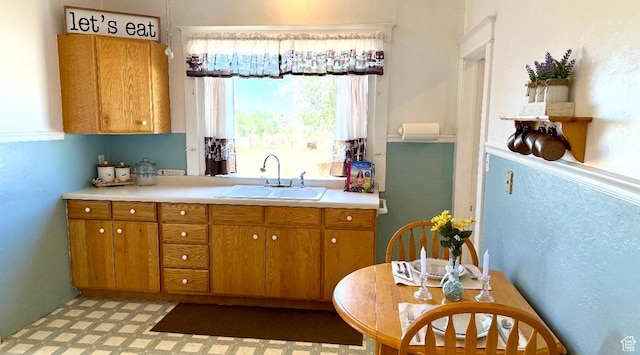 60 W 100th St N, Fillmore, UT 84631 - kitchen featuring brown cabinets, light countertops, and light flooring