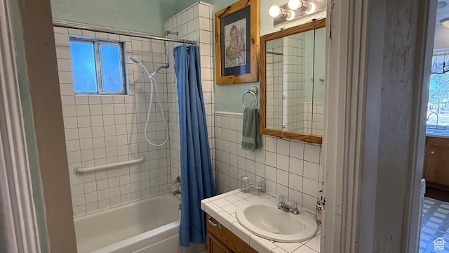 60 W 100th St N, Fillmore, UT 84631 - bathroom with vanity, shower / bathtub combination with curtain, and tile walls
