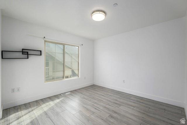 63 E Bridle Villa Dr, Draper, UT 84020 - spare room featuring wood finished floors