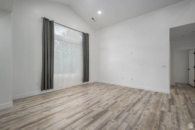 63 E Bridle Villa Dr, Draper, UT 84020 - empty room with wood finished floors, lofted ceiling, and recessed lighting