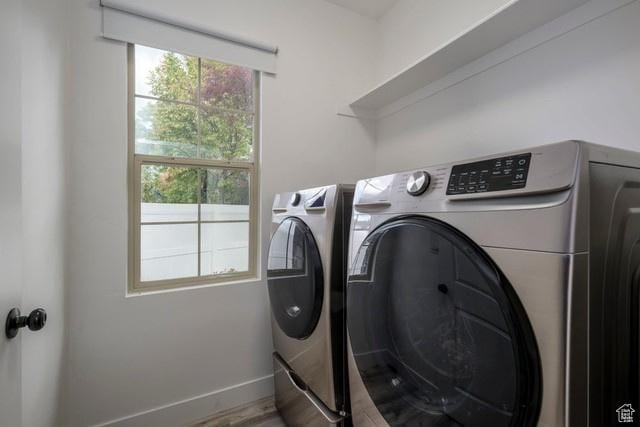 63 E Bridle Villa Dr, Draper, UT 84020 - washroom with separate washer and dryer and wood finished floors