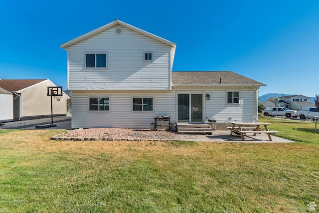 3149 E 1610 S, Spanish Fork, UT 84660 - back of property featuring a patio area, a lawn, and entry steps