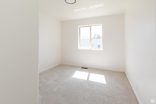 431 S Oakwood Dr W, Logan, UT 84321 - unfurnished room with light colored carpet and baseboards