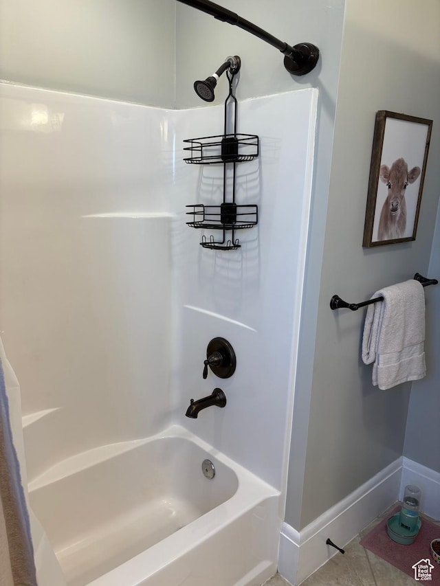 2044 Madison Ave, Ogden, UT 84401 - bathroom featuring shower / bath combination with curtain and tile patterned floors