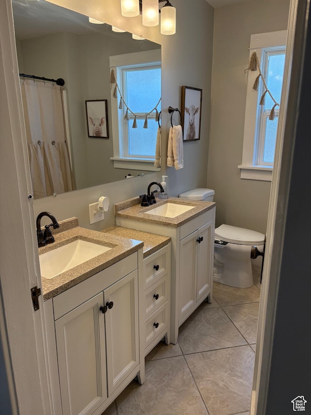 2044 Madison Ave, Ogden, UT 84401 - bathroom with vanity, plenty of natural light, tile patterned floors, and curtained shower