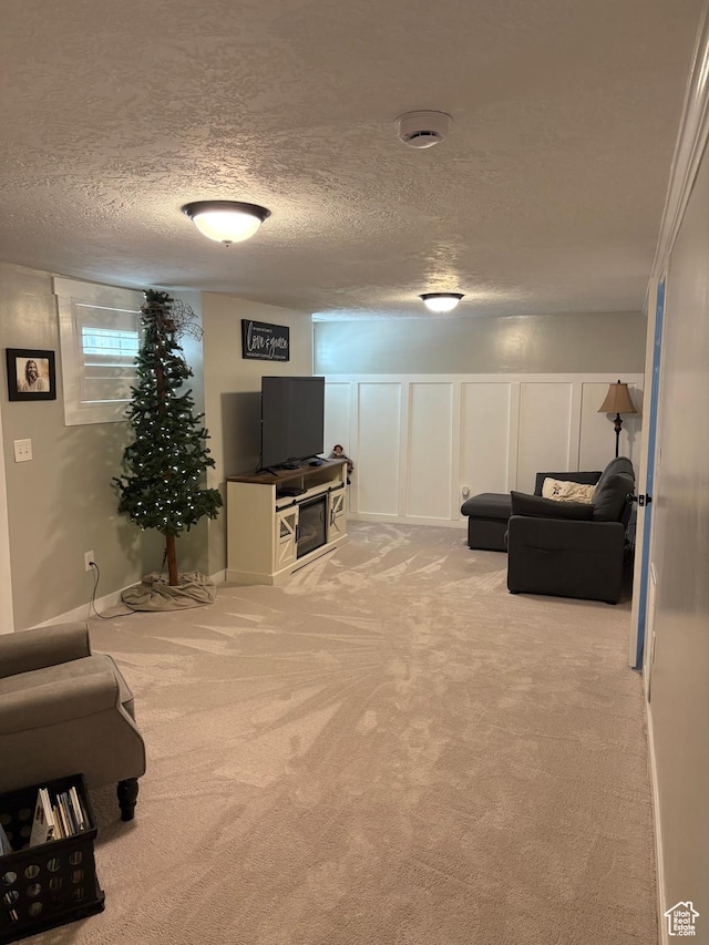 2044 Madison Ave, Ogden, UT 84401 - carpeted living room with a decorative wall and a textured ceiling