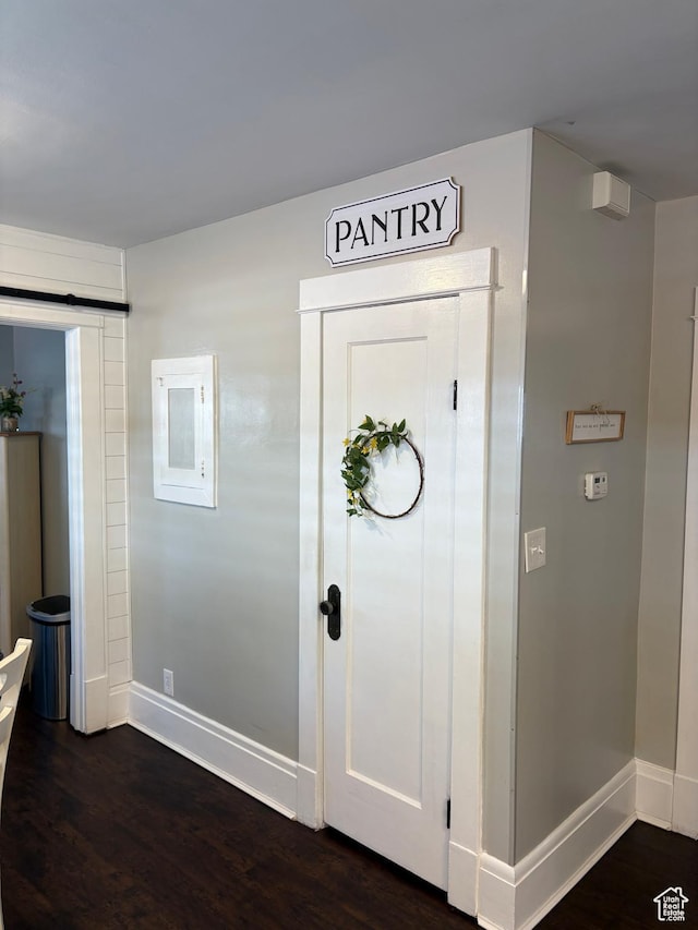 2044 Madison Ave, Ogden, UT 84401 - entryway featuring baseboards and dark wood-type flooring