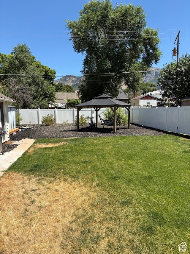2044 Madison Ave, Ogden, UT 84401 - fenced backyard with a gazebo