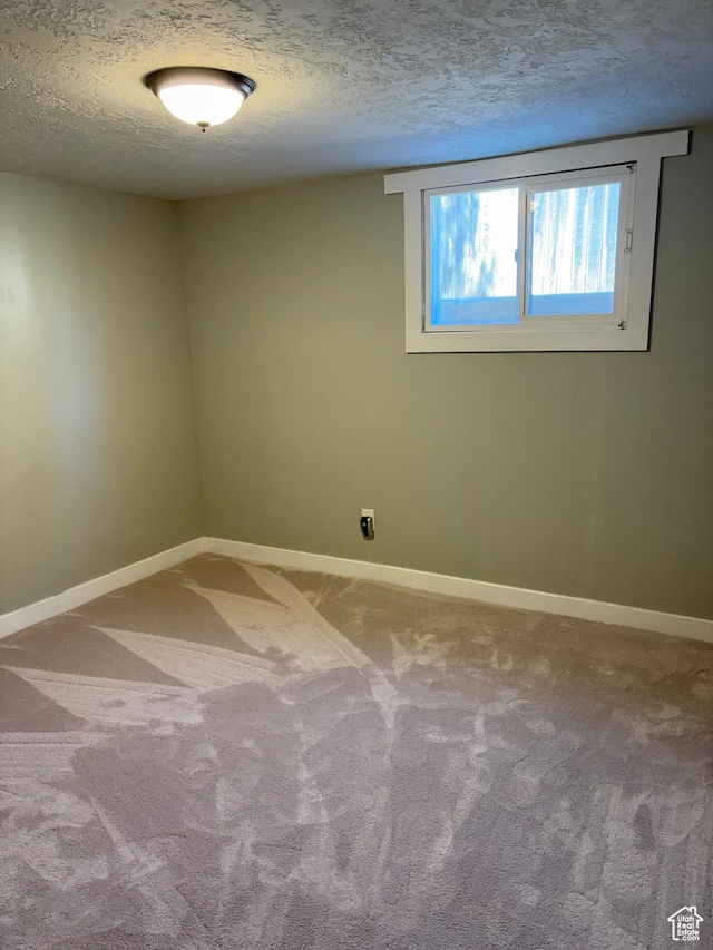 2044 Madison Ave, Ogden, UT 84401 - unfurnished room featuring carpet floors and a textured ceiling