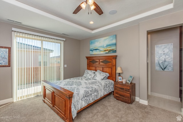 3429 W 175 N, Hurricane, UT 84737 - bedroom with access to exterior, light carpet, a tray ceiling, and ceiling fan