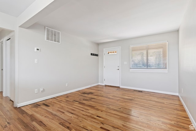 650 N 300 W Unit 229, Salt Lake City, UT 84103 - foyer with light wood-style flooring and baseboards