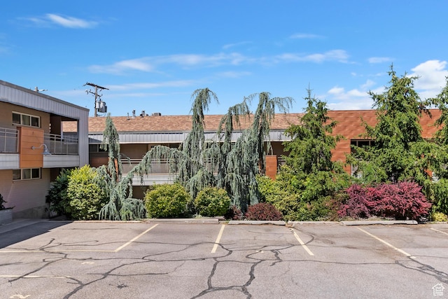 650 N 300 W Unit 229, Salt Lake City, UT 84103 - view of property featuring uncovered parking