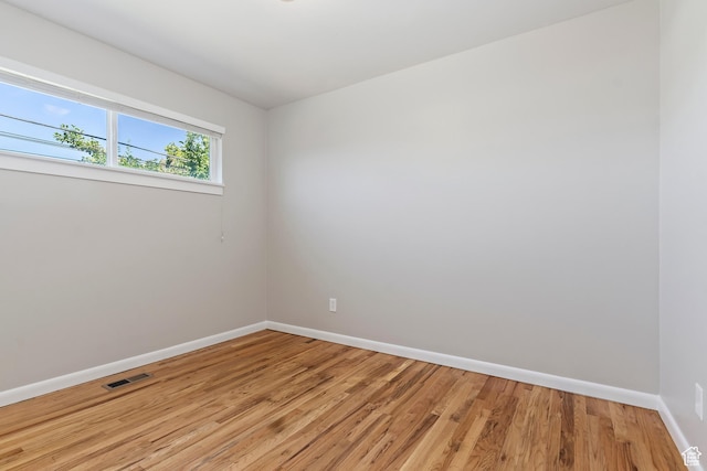 650 N 300 W Unit 229, Salt Lake City, UT 84103 - unfurnished room with baseboards and light wood-type flooring