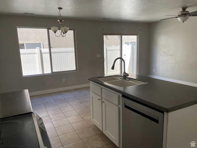 2126 W Fernside St, West Haven, UT 84401 - kitchen with dishwasher, dark countertops, white cabinets, a chandelier, and a textured ceiling