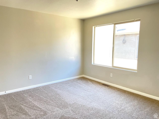 2126 W Fernside St, West Haven, UT 84401 - carpeted spare room with baseboards