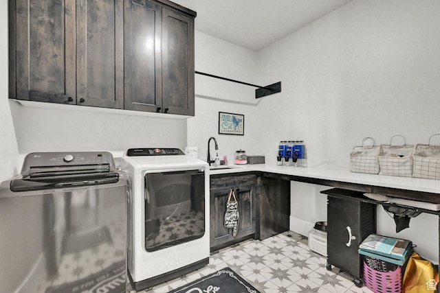2673 S 4950 W, Taylor, UT 84401 - laundry room with cabinet space, washing machine and dryer, and light floors