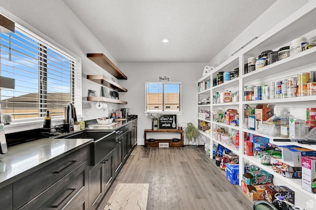 2673 S 4950 W, Taylor, UT 84401 - kitchen with open shelves, light wood-type flooring, dark cabinetry, and recessed lighting