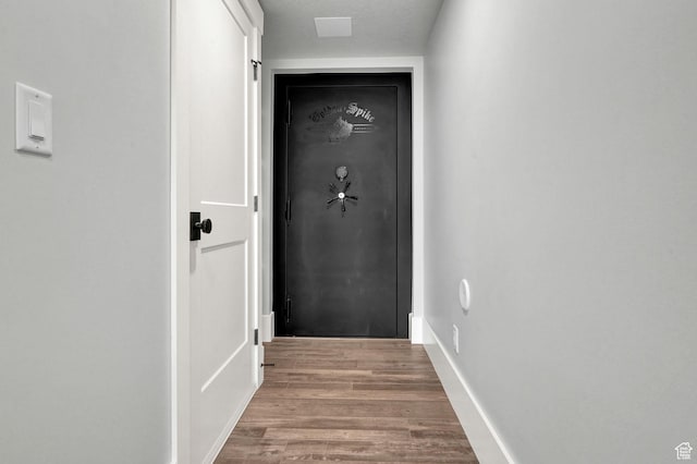 2673 S 4950 W, Taylor, UT 84401 - doorway to outside with wood finished floors and baseboards