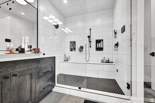 2673 S 4950 W, Taylor, UT 84401 - bathroom featuring a stall shower, vanity, and tile walls