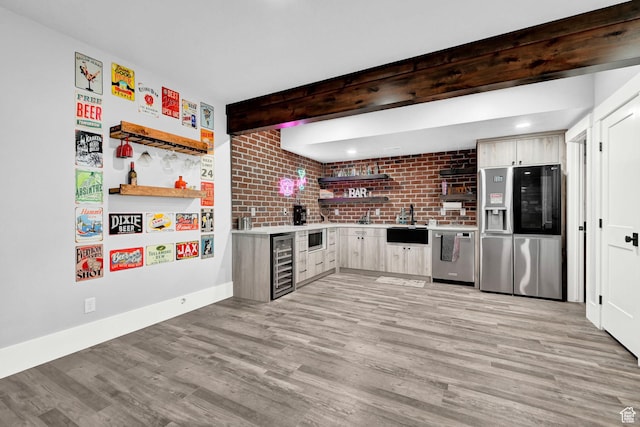 2673 S 4950 W, Taylor, UT 84401 - kitchen with appliances with stainless steel finishes, open shelves, wine cooler, light wood finished floors, and light countertops