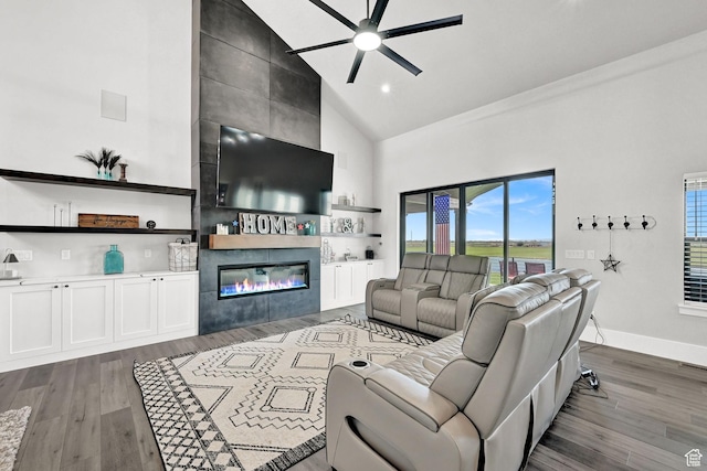 2673 S 4950 W, Taylor, UT 84401 - living room featuring high vaulted ceiling, a ceiling fan, wood finished floors, and a fireplace