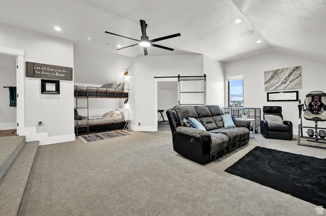 2673 S 4950 W, Taylor, UT 84401 - living area with a barn door, ceiling fan, carpet, vaulted ceiling, and recessed lighting