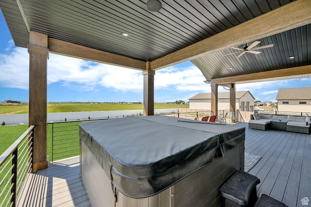 2673 S 4950 W, Taylor, UT 84401 - deck featuring a hot tub, ceiling fan, and outdoor lounge area