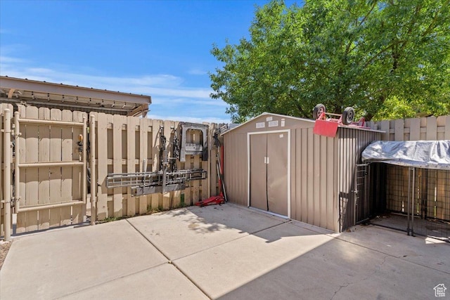 5659 Woodshire Ct, South Ogden, UT 84403 - fenced backyard featuring a shed and a patio area