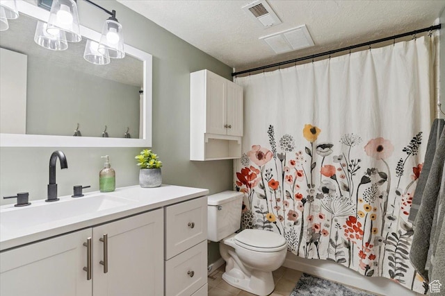 5659 Woodshire Ct, South Ogden, UT 84403 - full bathroom with vanity, tile patterned floors, and a textured ceiling